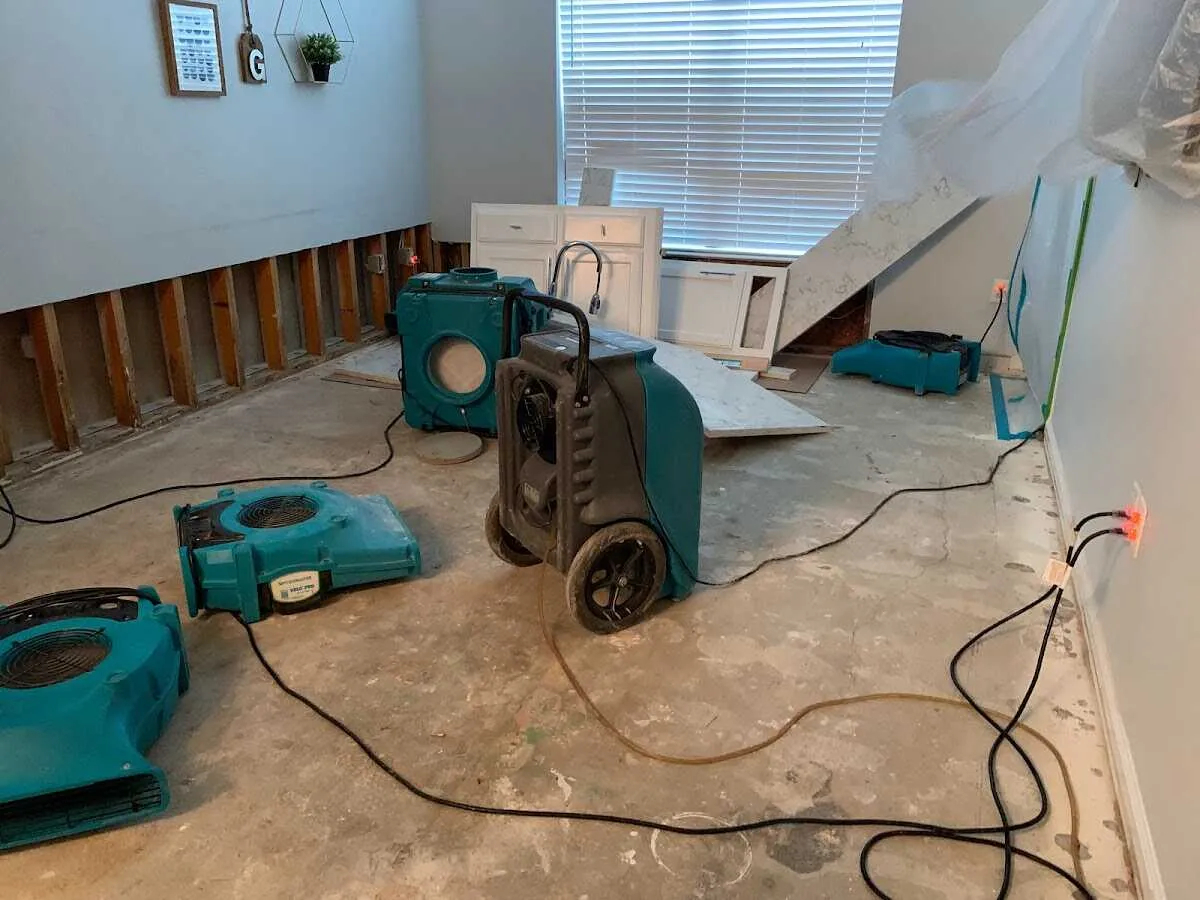 Dehumidifier in flood-cut room for Water Damage Restoration in Brockton